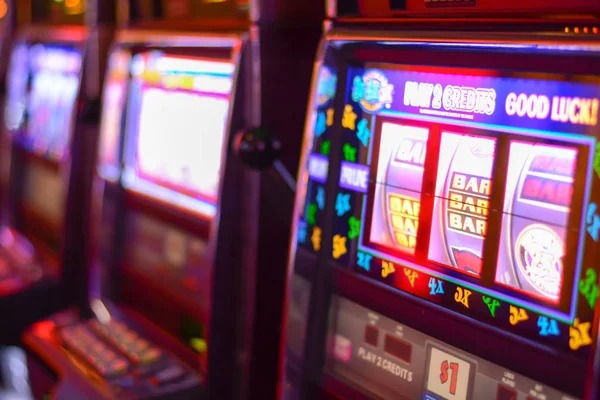 Live Casino Hold'em table with dealer and community cards